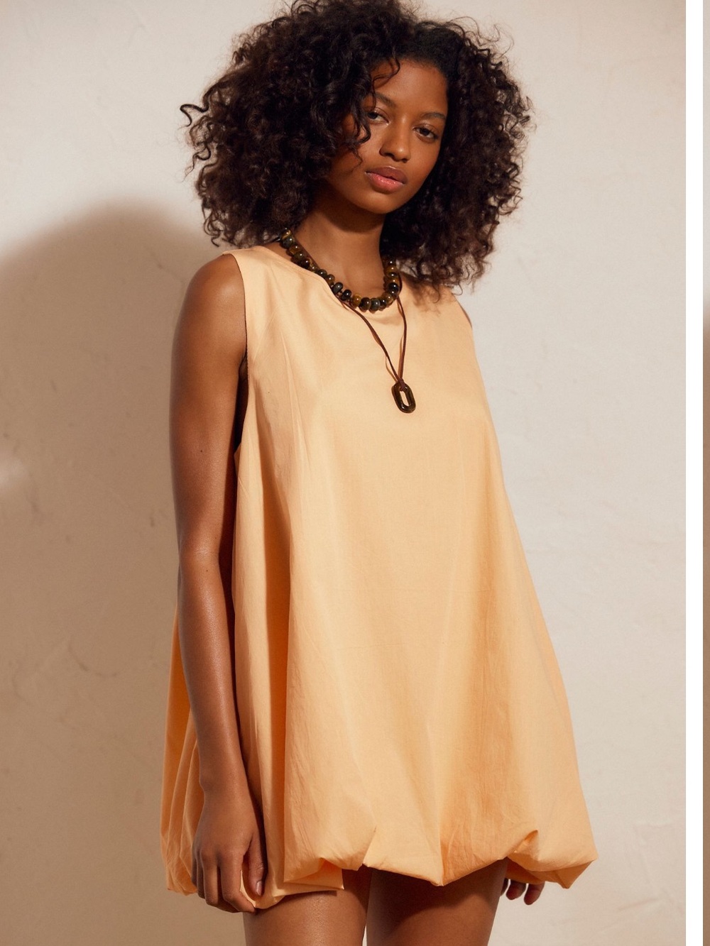 Peach Wash Bubble Hem Sleeveless Mini Dress